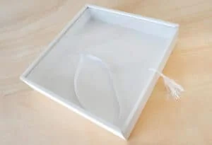 Alto: Caja de álbumes 3F, ideal para recuerdos y fotografías, diseño elegante y práctica.