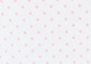 Baldosas de cerámica con diseño de puntos rosas en fondo blanco.